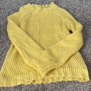 yellow sweater